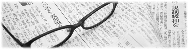 Tidning och glasögon